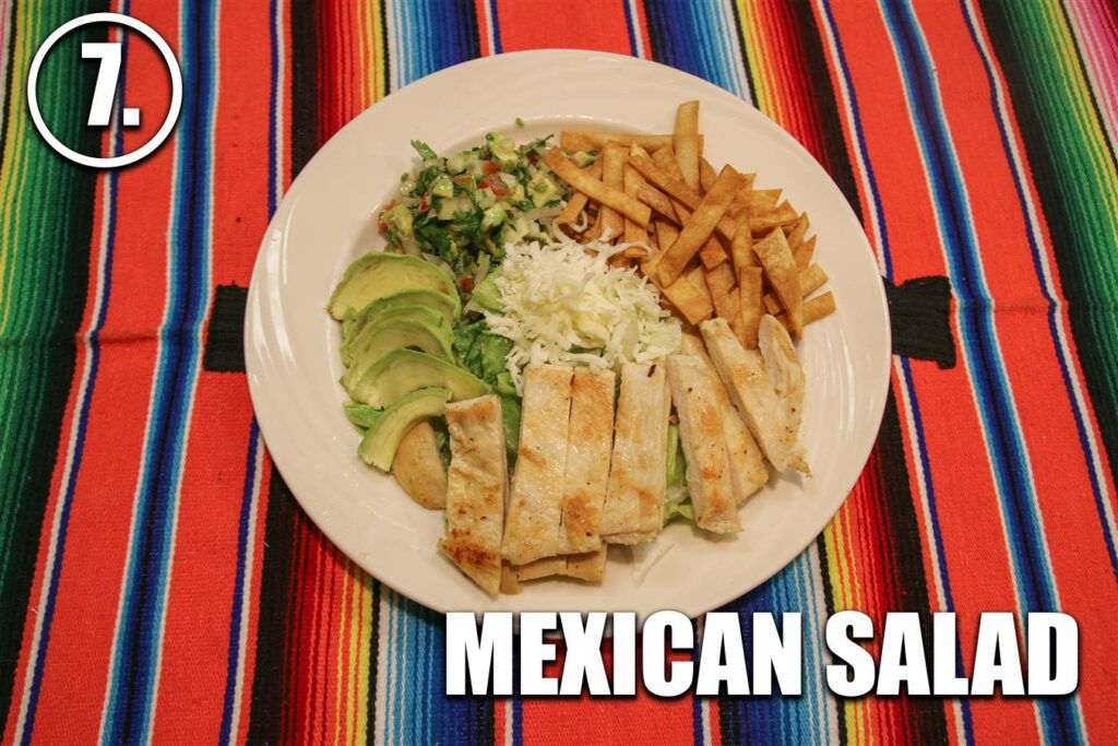 A plate of mexican food with text that reads " mexican salad ".